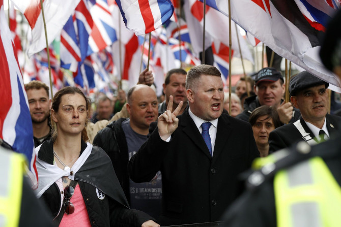Paul Golding, the leader of Britain First, gestures during a march held following the recent Westminster attack, in central London, Britain April 1, 2017.