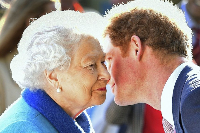 Britain's Queen Elizabeth greets her grandson Prince Harry at the Chelsea Flower Show on press day in London, Britain May 18, 2015.