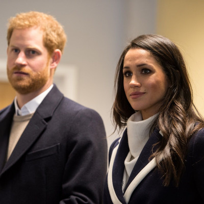 Britain's Prince Harry and his fiancee Meghan Markle watch Coach Core apprentices taking part in a training masterclass exercise at Nechells Wellbeing Centre in Birmingham, Britain, March 8, 2018.