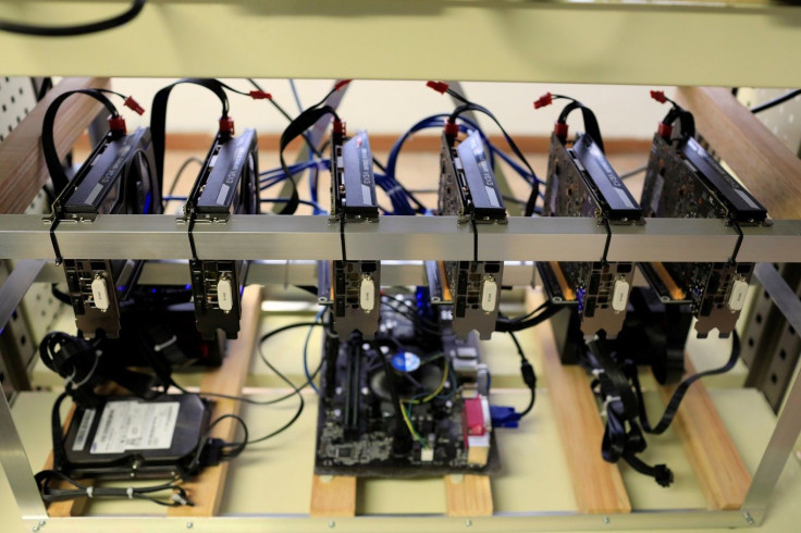 Video cards chained as a rig for mining cryptocurrencies are seen at a facility of the Youth and Sports Ministry in Caracas, Venezuela February 23, 2018.