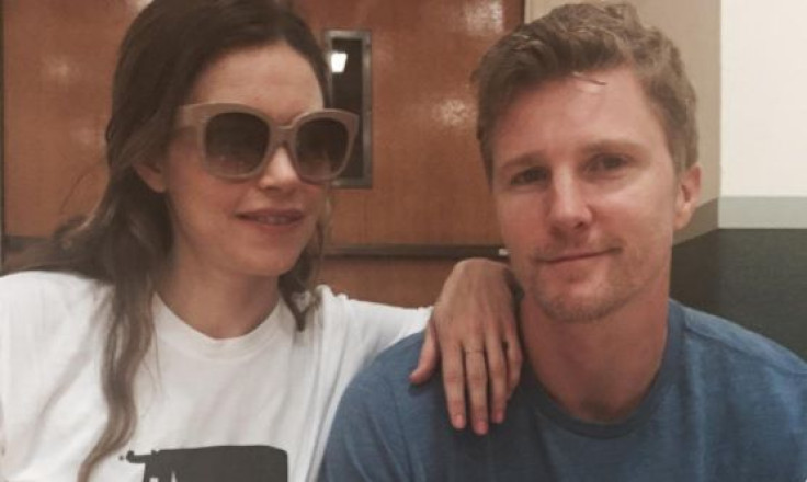 The Young and the Restless stars Thad Luckinbill and Amelia Heinle pose for a photo together