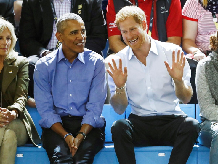 Britain's Prince Harry (R) and former U.S. President Barack Obama 