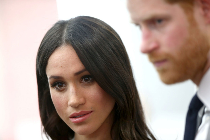 Britain's Prince Harry and his fiancee Meghan Markle attend a reception with delegates from the Commonwealth Youth Forum at the Queen Elizabeth II Conference Centre, London, April 18, 2018.