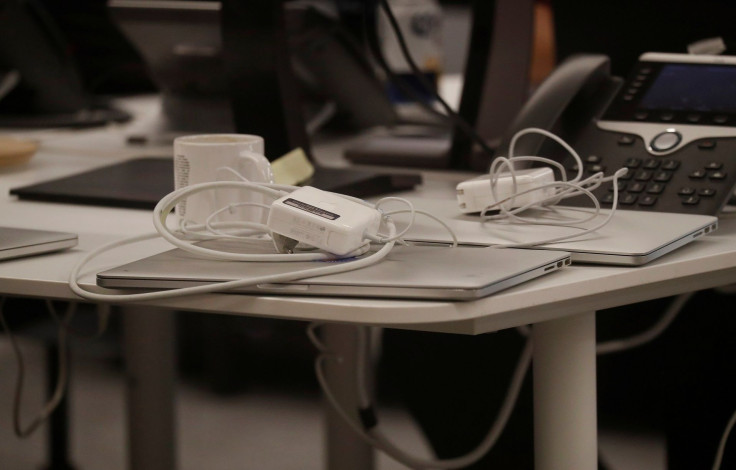 Laptops sit on a table in the empty offices of Cambridge Analytica in Washington, D.C., U.S., May 2, 2018.