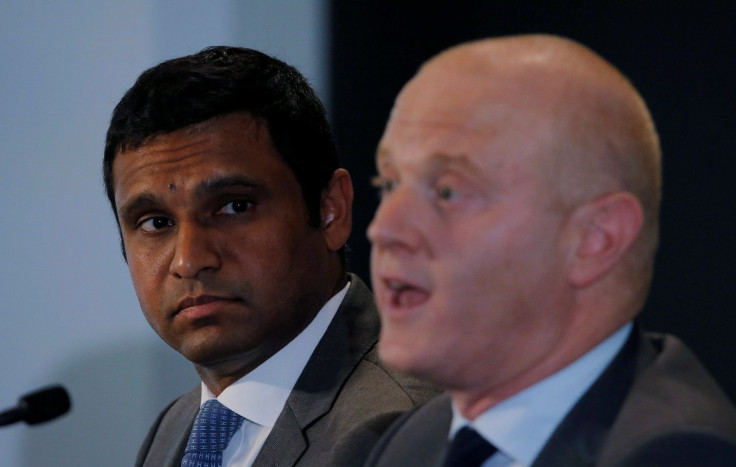 Commonwealth Bank (CBA) CFO Rob Jesudason (L) watches on as CEO Ian Narev speaks at a news conference announcing the bank's full year results in Sydney, Australia, August 9, 2017.