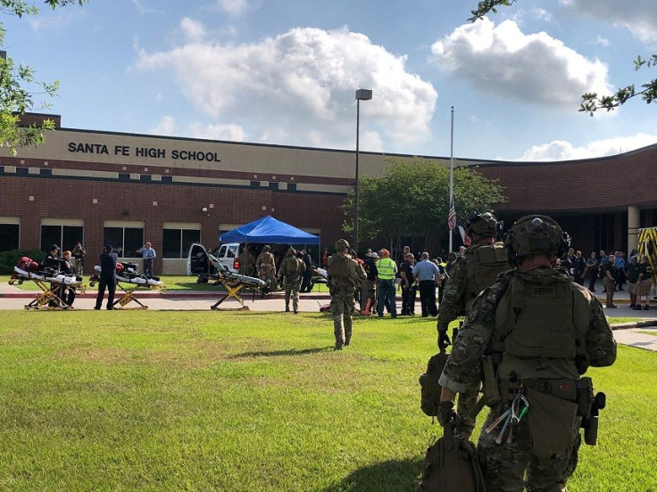 Law enforcement officers are responding to Santa Fe High School following a shooting incident in this Harris County Sheriff office, Santa Fe, Texas, U.S., photo released on May 18, 2018.