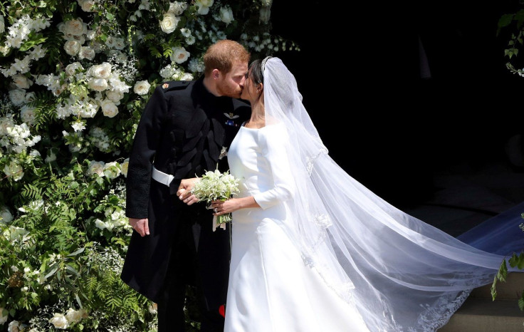 Prince Harry and Meghan Markle leave St George's Chapel in Windsor Castle after their wedding. in Windsor, Britain, May 19, 2018.