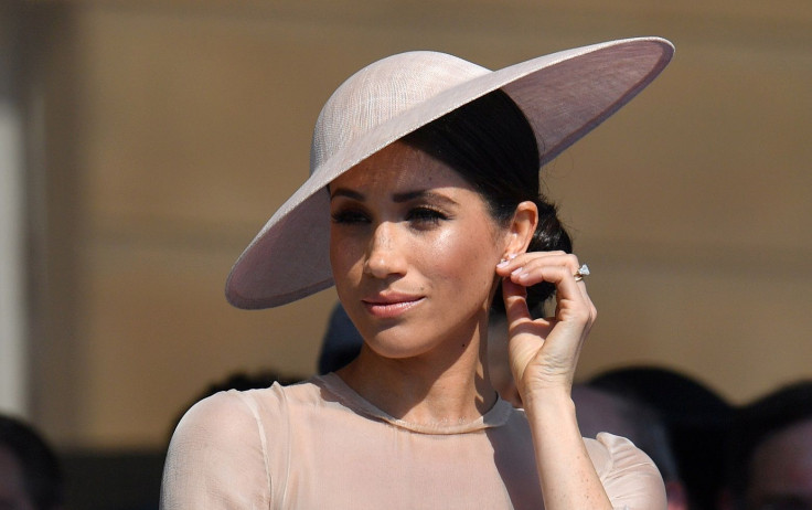 Meghan, Duchess of Sussex attends a garden party at Buckingham Palace, in London, Britain May 22, 2018.