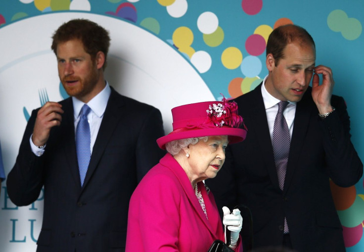 Britain's Queen Elizabeth prepares to speak as Prince William, and Prince Harry (L)