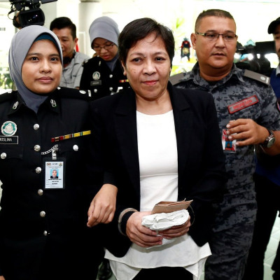 Australian Maria Elvira Pinto Exposto leaves following her release at the High Court in Shah Alam, outside Kuala Lumpur, Malaysia December 27, 2017.