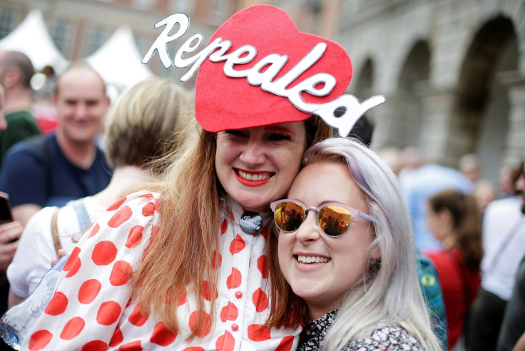 People celebrate the result of yesterday's referendum on liberalizing abortion law, in Dublin, Ireland, May 26, 2018.