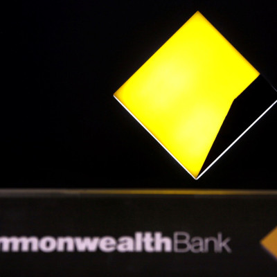 FILE PHOTO: A Commonwealth Bank logo adorns an Automatic Tellar Machine (ATM) located in Sydney, Australia November 12, 2014.