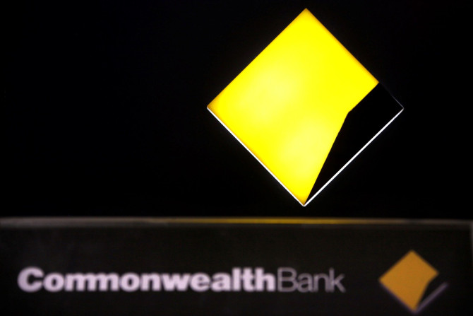 FILE PHOTO: A Commonwealth Bank logo adorns an Automatic Tellar Machine (ATM) located in Sydney, Australia November 12, 2014.