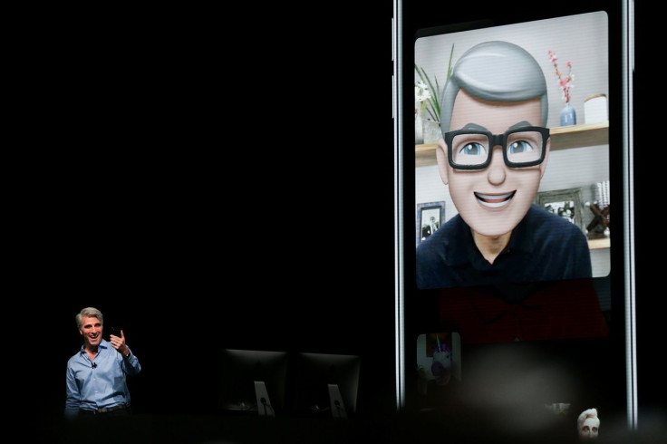 Apple senior vice president of Software Engineering Craig Federighi speaks with Apple CEO Tim Cook