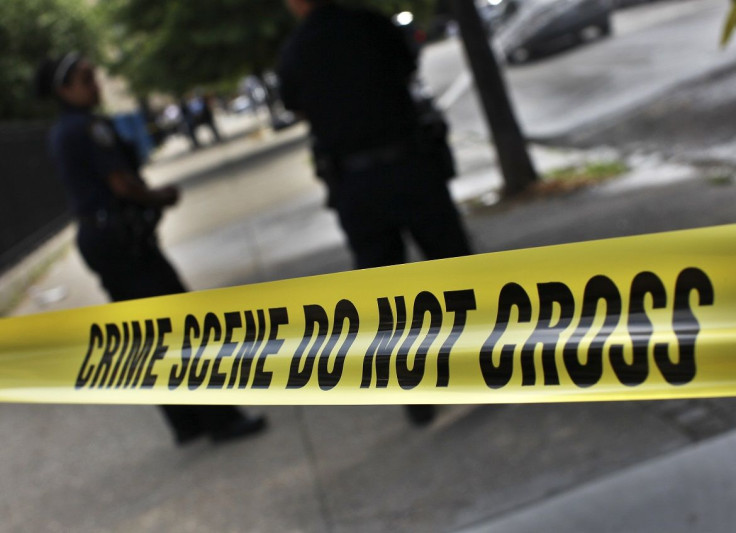 NYPD crime scene tape is seen at the site of a shooting at the corner of Marcus Garvey Blvd. and Pulaski Street in the Brooklyn borough of New York July 9, 2012.