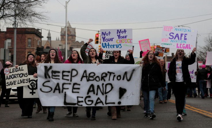 Supporters of Planned Parenthood rally outside a Planned Parenthood clinic in Detroit, Michigan, U.S. February 11, 2017.