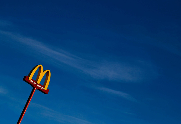 A sign for the U.S. fast food restaurant chain McDonald's is seen outside one of their restaurants in Sint-Pieters-Leeuw, near Brussels, Belgium February 14, 2018.