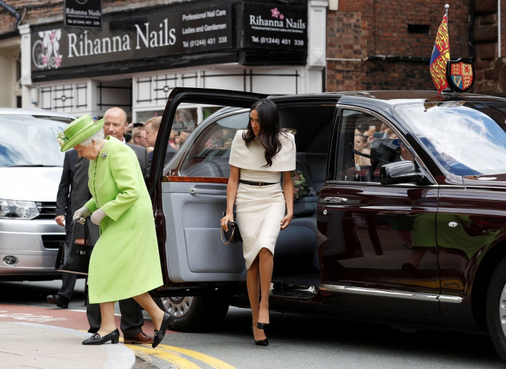 Britain's Queen Elizabeth and Meghan, the Duchess of Sussex, arrive at the Storyhouse during their visit to Chester, June 14, 2018.