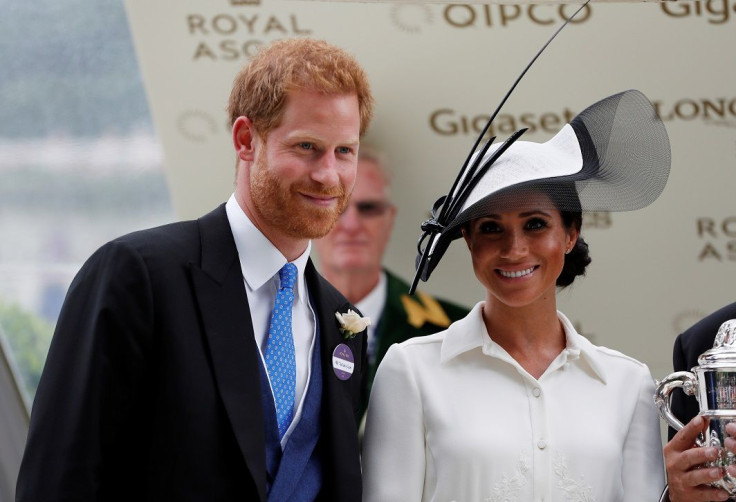 Horse Racing - Royal Ascot - Ascot Racecourse, Ascot, Britain - June 19, 2018   Meghan, the Duchess of Sussex and Britain's Prince Harry look on