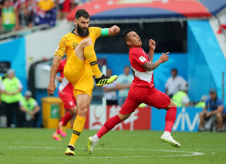 Soccer Football - World Cup - Group C - Australia vs Peru - Fisht Stadium, Sochi, Russia - June 26, 2018   Australia's Mile Jedinak in action with Peru's Christian Cueva