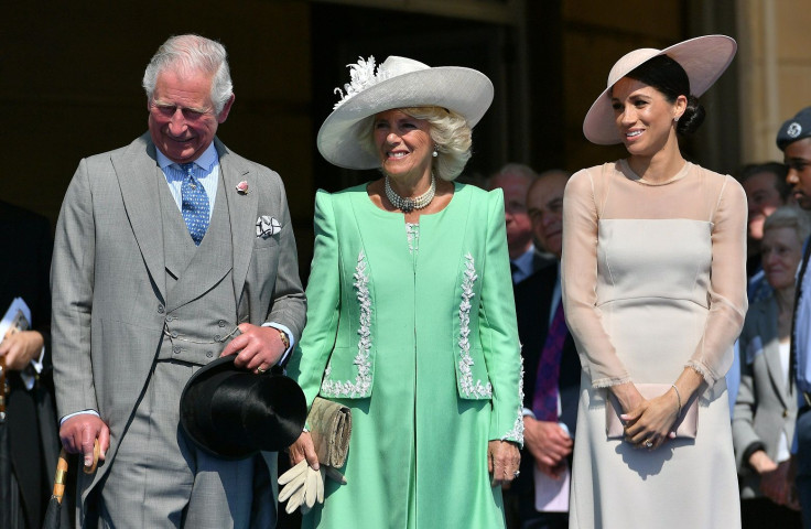 Meghan, Duchess of Sussex attends a garden party at Buckingham Palace, with Camilla the Duchess of Cornwall and Prince Charles, in London, Britain May 22, 2018.