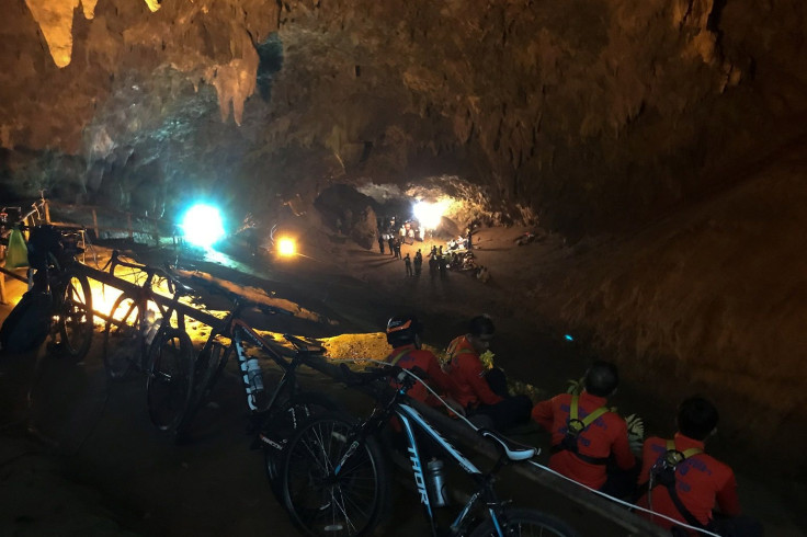 Rescue teams are seen inside of the Tham Luang caves where 13 members of an Under 16 soccer team