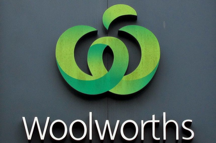 A Woolworths logo is displayed above one of the company's supermarkets in Sydney, Australia, February 26, 2016.