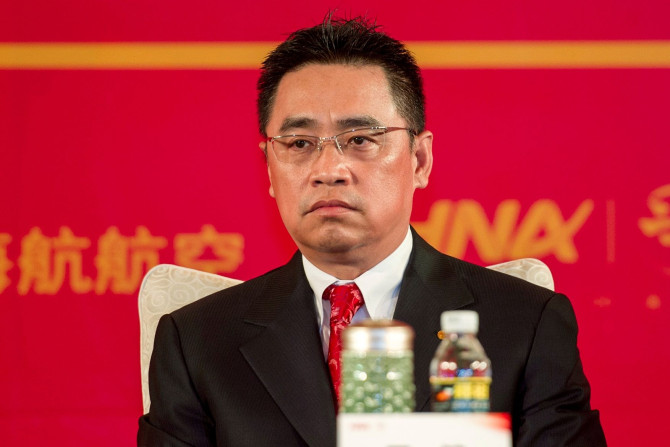 Wang Jian, Co-Chairman of HNA Group attends a meeting marking the 20th anniversary of company's founding in Haikou, Hainan province, China, April 28, 2013. Picture taken April 28, 2013.