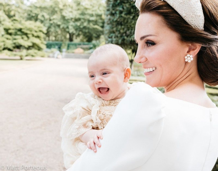 Catherine, Duchess of Cambridge, holds her youngest child, Prince Louis, after his christening in Chapel Royal at St James's Palace on July 9. Photographer: Matt Porteous