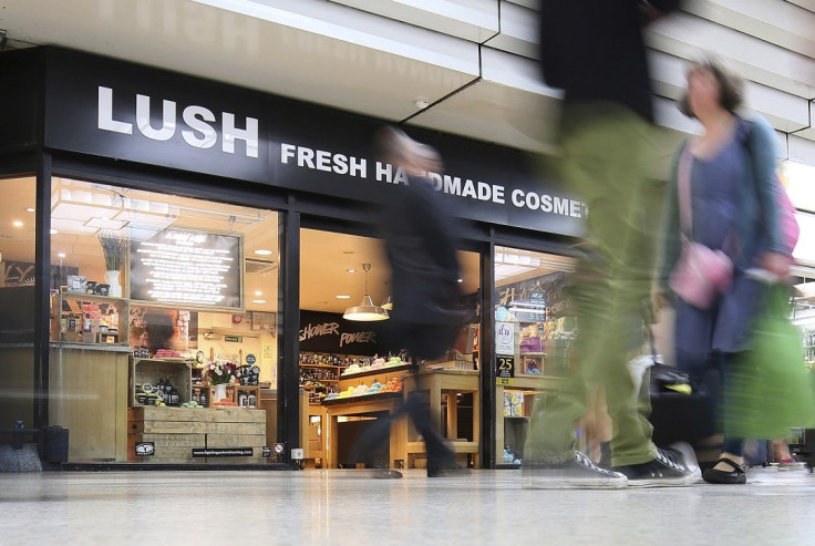 People walk pass a Lush cosmetics store in London, Britain July 8, 2016.