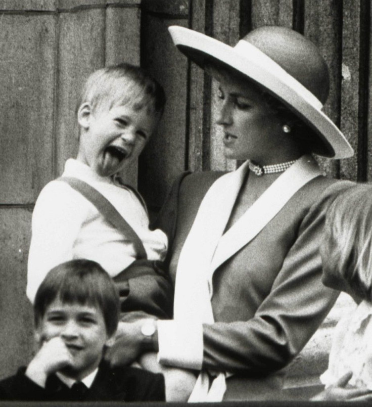 Princess Diana holds Prince Harry as her older son Prince William