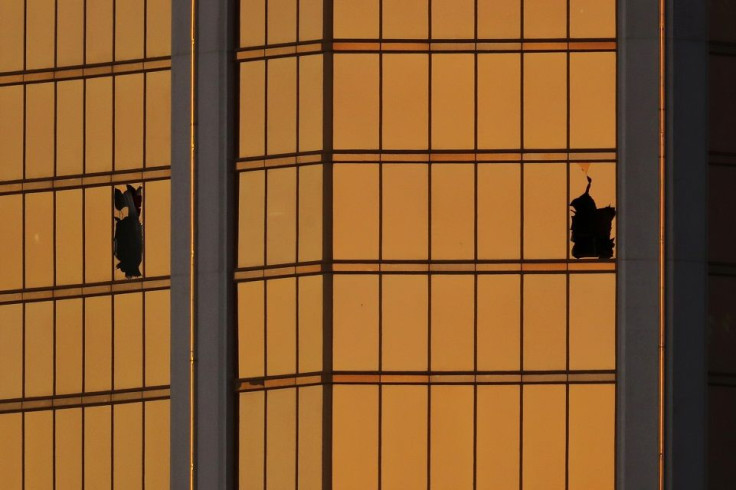 Morning light reflects off the Mandalay Bay hotel and the broken windows where shooter Stephen Paddock conducted his shooting spree