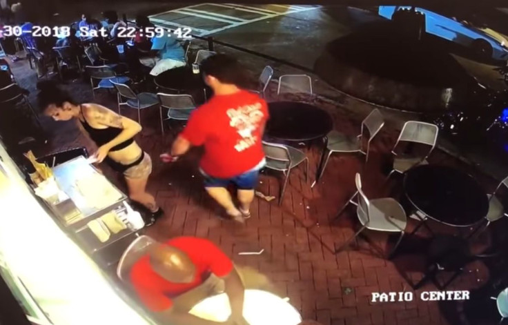 Emelia Holden is seen being touched without consent by Ryan Cherwinski at Vinnie Van Go-Go's in Savannah, Georgia, in this surveillance footage on June 30, 2018.