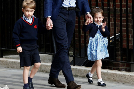 Britain's Prince William arrives at the Lindo Wing of St Mary's Hospital with his children Prince George and Princess Charlotte after his wife Catherine, the Duchess of Cambridge, gave birth to a son, in London, April 23, 2018.