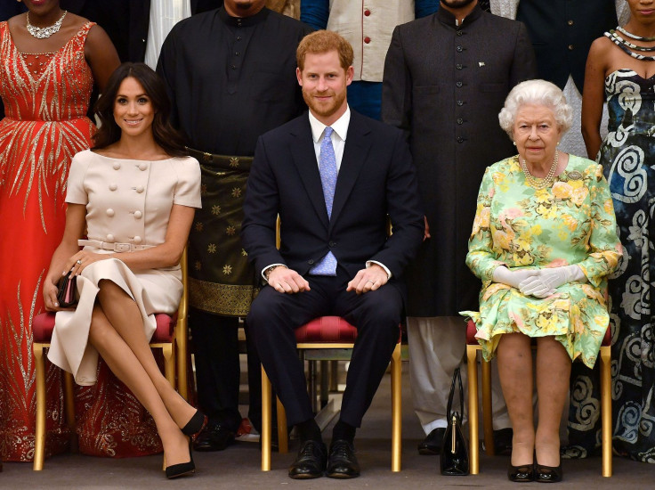 Britain's Queen Elizabeth, Prince Harry and Meghan, the Duchess of Sussex