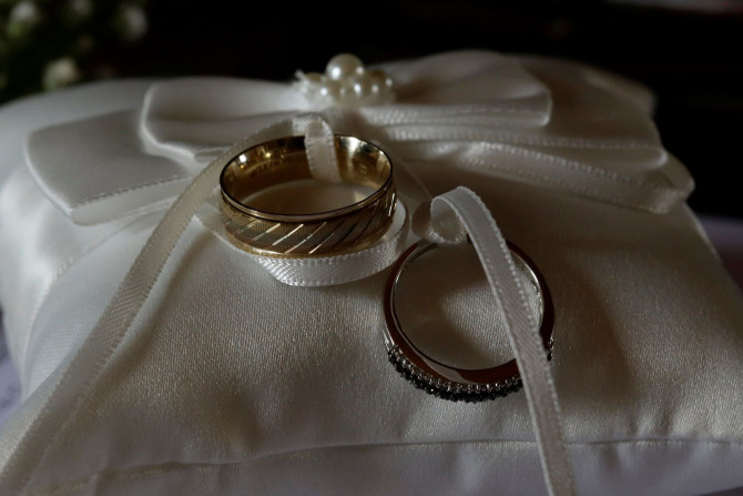 Wedding rings are seen before a wedding in a catholic church in Heredia, Costa Rica May 20, 2018.