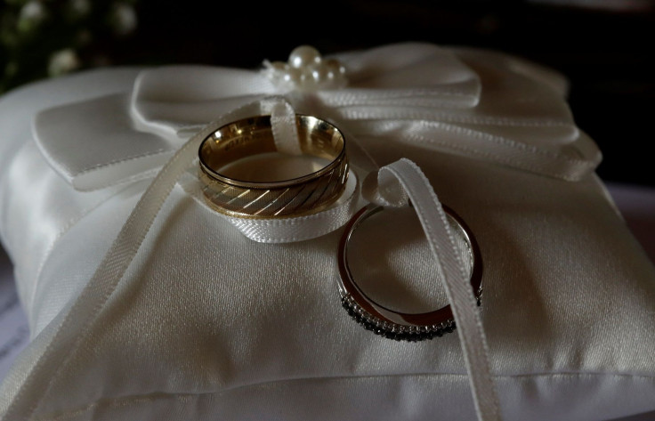 Wedding rings are seen before a wedding in a catholic church in Heredia, Costa Rica May 20, 2018.