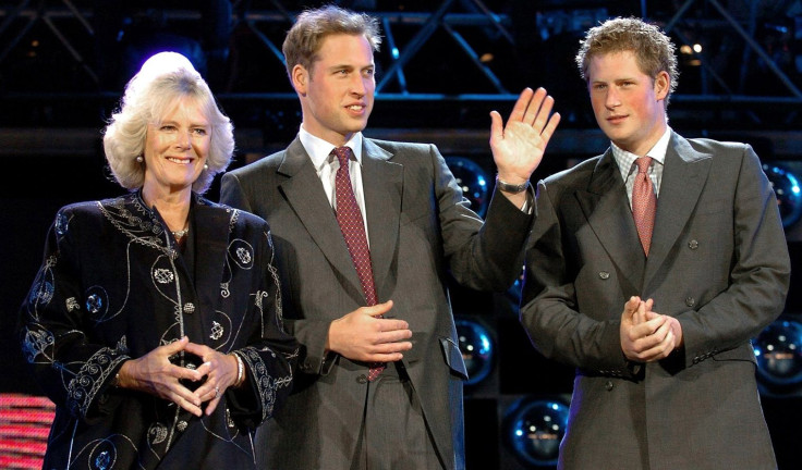 Camilla (L), the Duchess of Cornwall stands on stage with Prince William (C) and Prince Harry