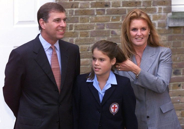 Britian's Princess Eugenie (C) arrives for her first day at St. Georges School, Windsor September 6, 2001, accompanied by her parents the Duke and Duchess of York (R)