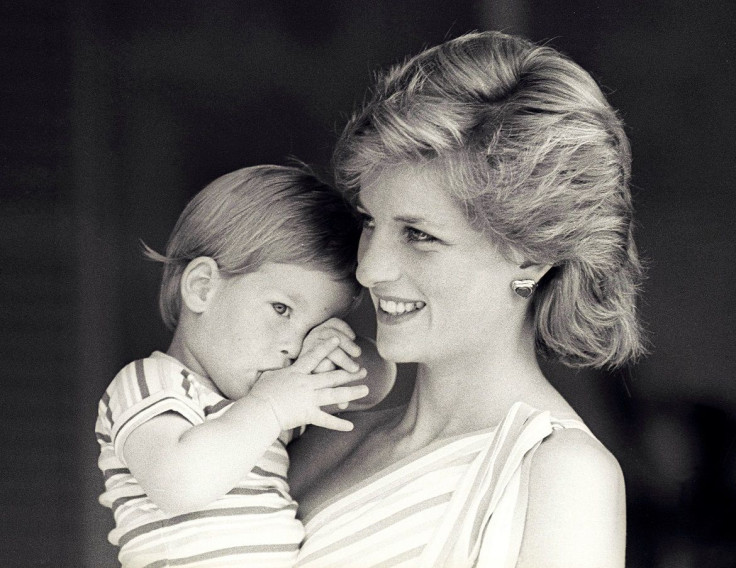 Britain's Princess Diana holds Prince Harry
