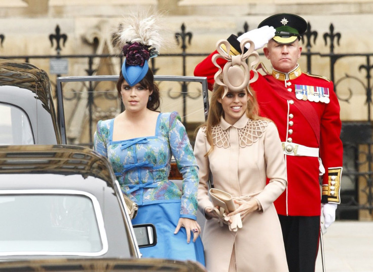 Britain's Princess Eugenie (L) and Princess Beatrice arrive at Westminster Abbey before the wedding of Britain's Prince William and Kate Middleton, in central London April 29, 2011.