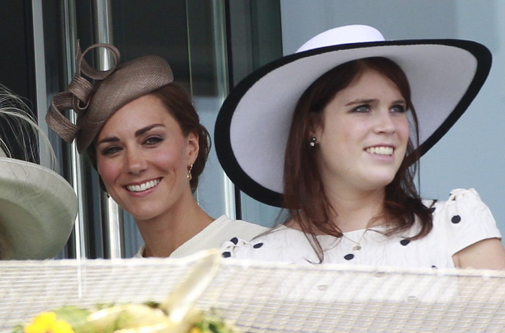 Catherine, Britain's Duchess of Cambridge (L) and Princess Eugenie watch the fourth race at Epsom Racecourse in southern England June 4, 2011.