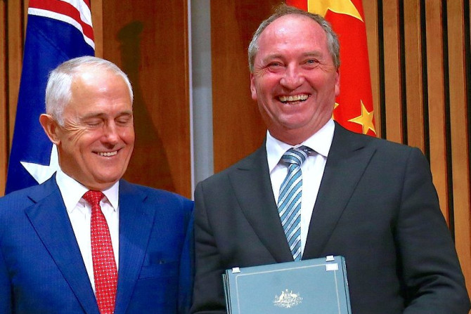 Australia's Prime Minister Malcolm Turnbull stands next to Barnaby Joyce