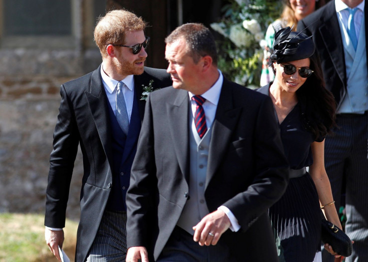 Britain's Prince Harry and Meghan, Duchess of Sussex, walk out of the Church of St. Mary the Virgin, after the wedding of Daisy Jenks and Charlie Van Straubenzee, in Frensham, Surrey, Britain, August 4, 2018.