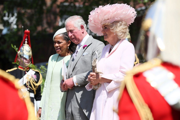 (Left-right) Doria Ragland, mother of the bride, the Prince of Wales and the Duchess of Cornwall