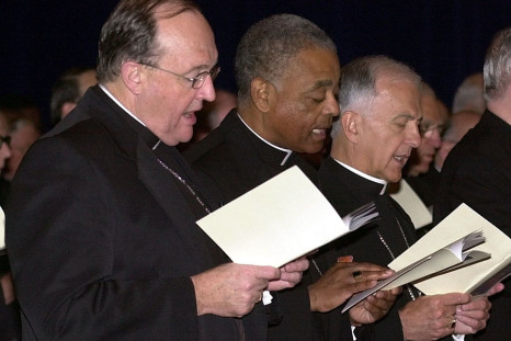 Bishop Philip Wilson (left), from Adelaide, Australia, Bishop Wilton D. Gregory of Belleville, Illinois (center) and Bishop Dale J. Melczek (right), from Gary, Indiana