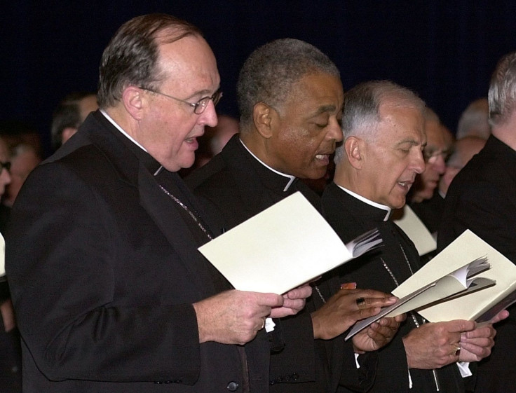 Bishop Philip Wilson (left), from Adelaide, Australia, Bishop Wilton D. Gregory of Belleville, Illinois (center) and Bishop Dale J. Melczek (right), from Gary, Indiana