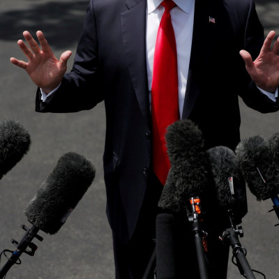 U.S. President Donald Trump speaks to the media before departing the White House for a trip to New York, in Washington, U.S. May 23, 2018.