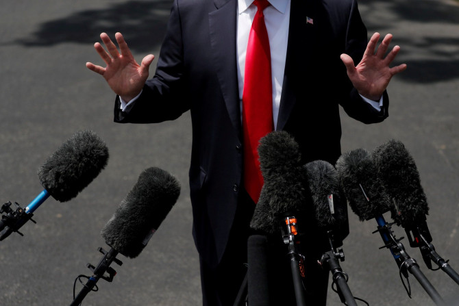 U.S. President Donald Trump speaks to the media before departing the White House for a trip to New York, in Washington, U.S. May 23, 2018.