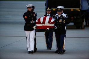 The casket containing the remains of Senator John McCain (R-AZ) is carried by honor guards at Joint Base Andrews in Maryland, U.S., August 30, 2018. 